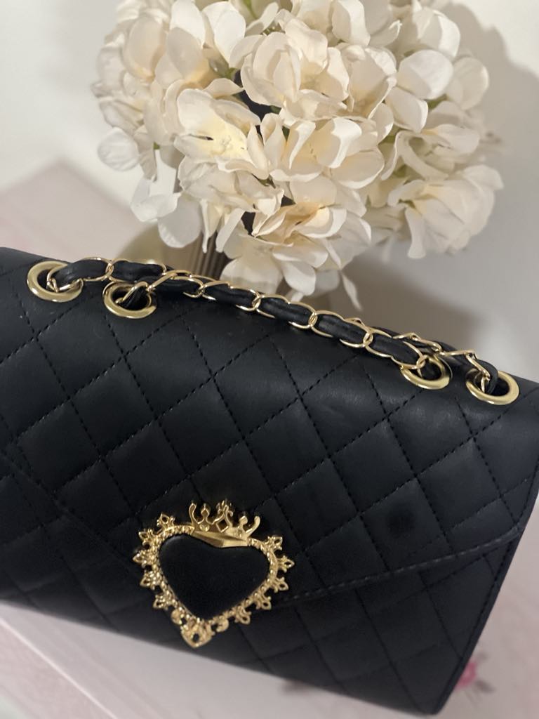 POCHETTE NERA CON CUORE SACRO